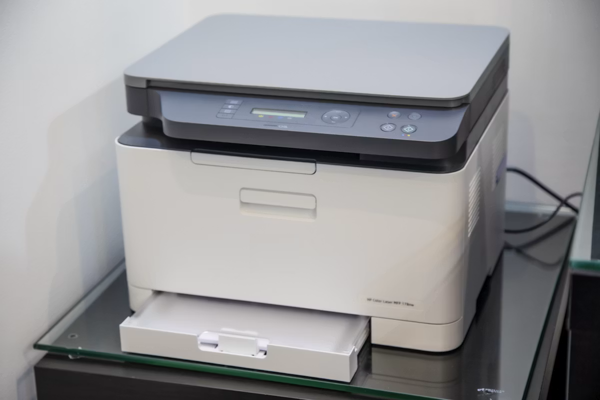 Office printer on a desk ready for support
